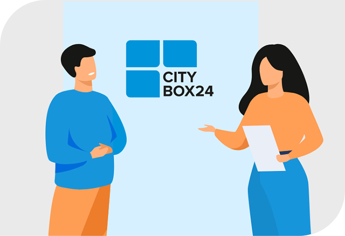 Ein Kunde und ein Mitarbeiter bei an einem CityBox24 Standort - Lagerbox anschauen Ein Kunde und ein Mitarbeiter bei an einem CityBox24 Standort - Lagerbox anschauen